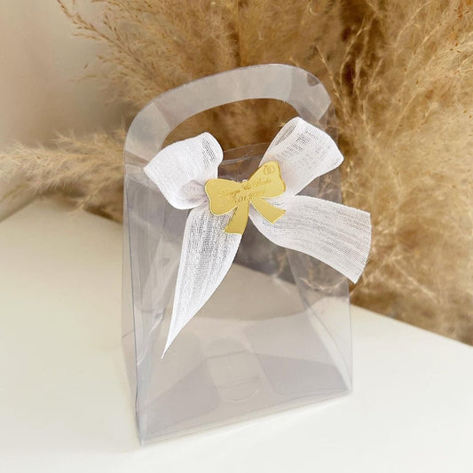 Sac Mona en plastique transparent avec nœud en lin et gravure plexiglas doré