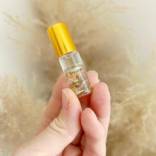 Musc Evasion avec feuilles d'or, parfum de luxe personnalisé